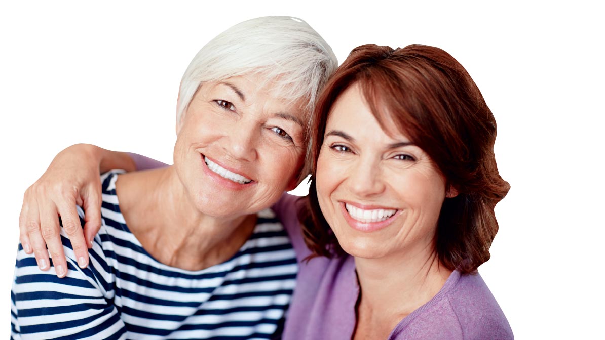 older woman and younger woman embracing and smiling